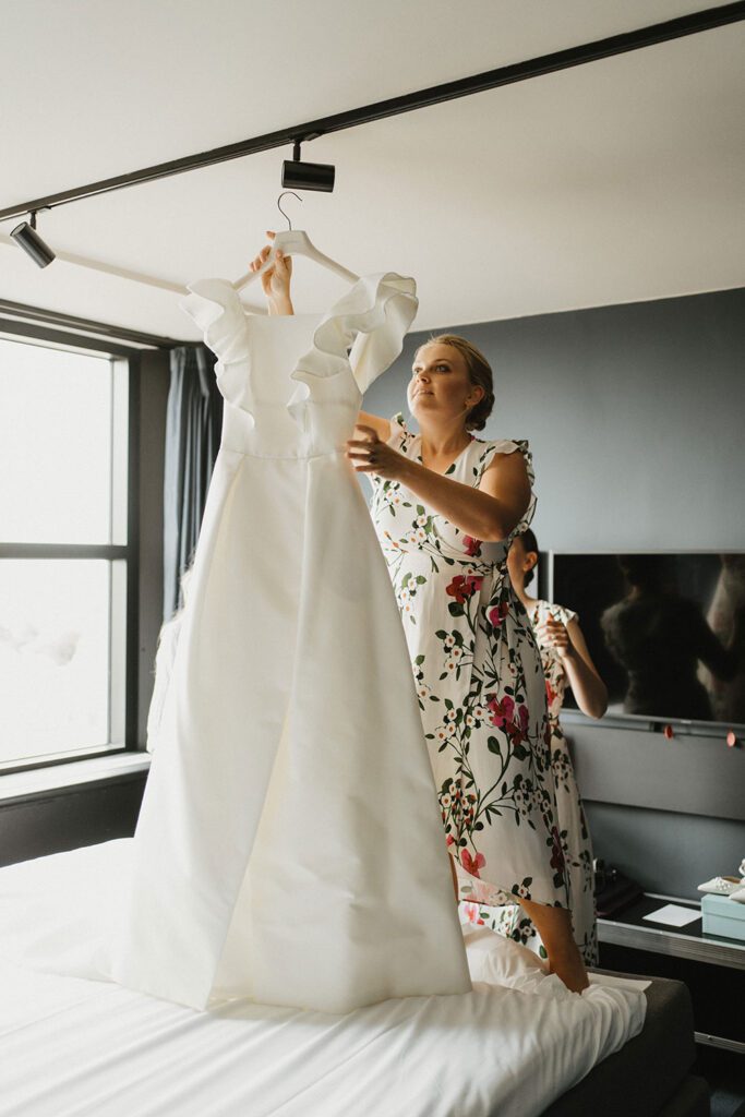 Victoria in a custom Jesus Peiro wedding dress for a city wedding in ...