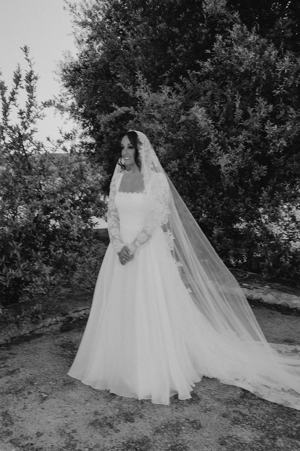 Real bride Kirby wearing the Suzanne Neville Hailey wedding dress with bespoke lace top by Nortier
